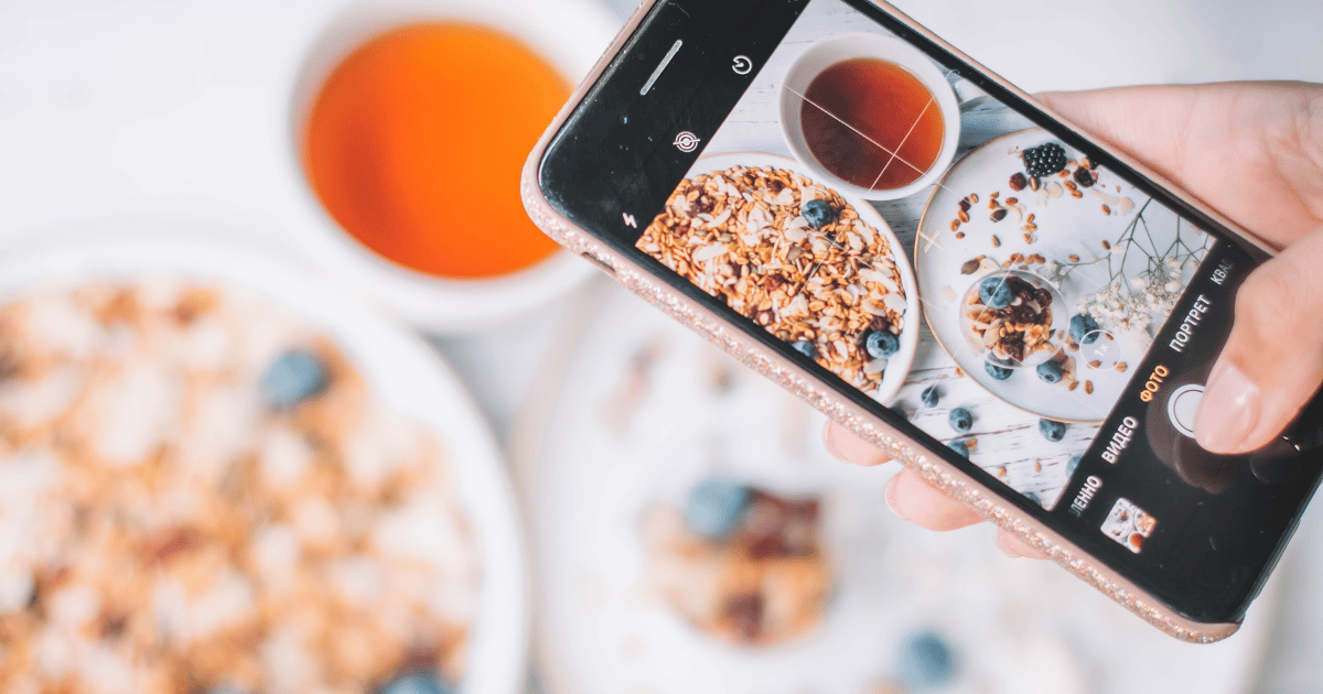 Name Your Blog shows a photographer taking a picture of a tabletop.